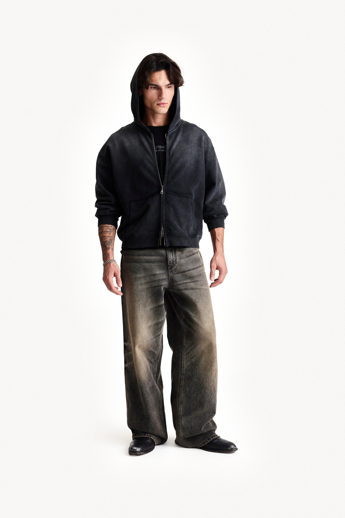 Zip Hoodie in Black, front view on model with hood up