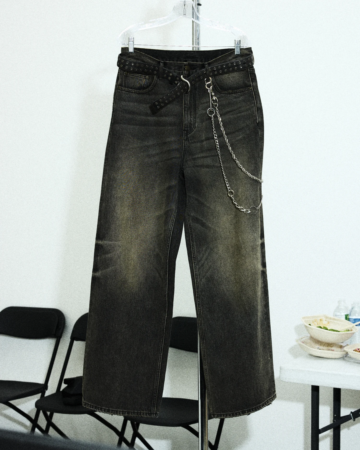Wide Denim jeans hanging in the studio.